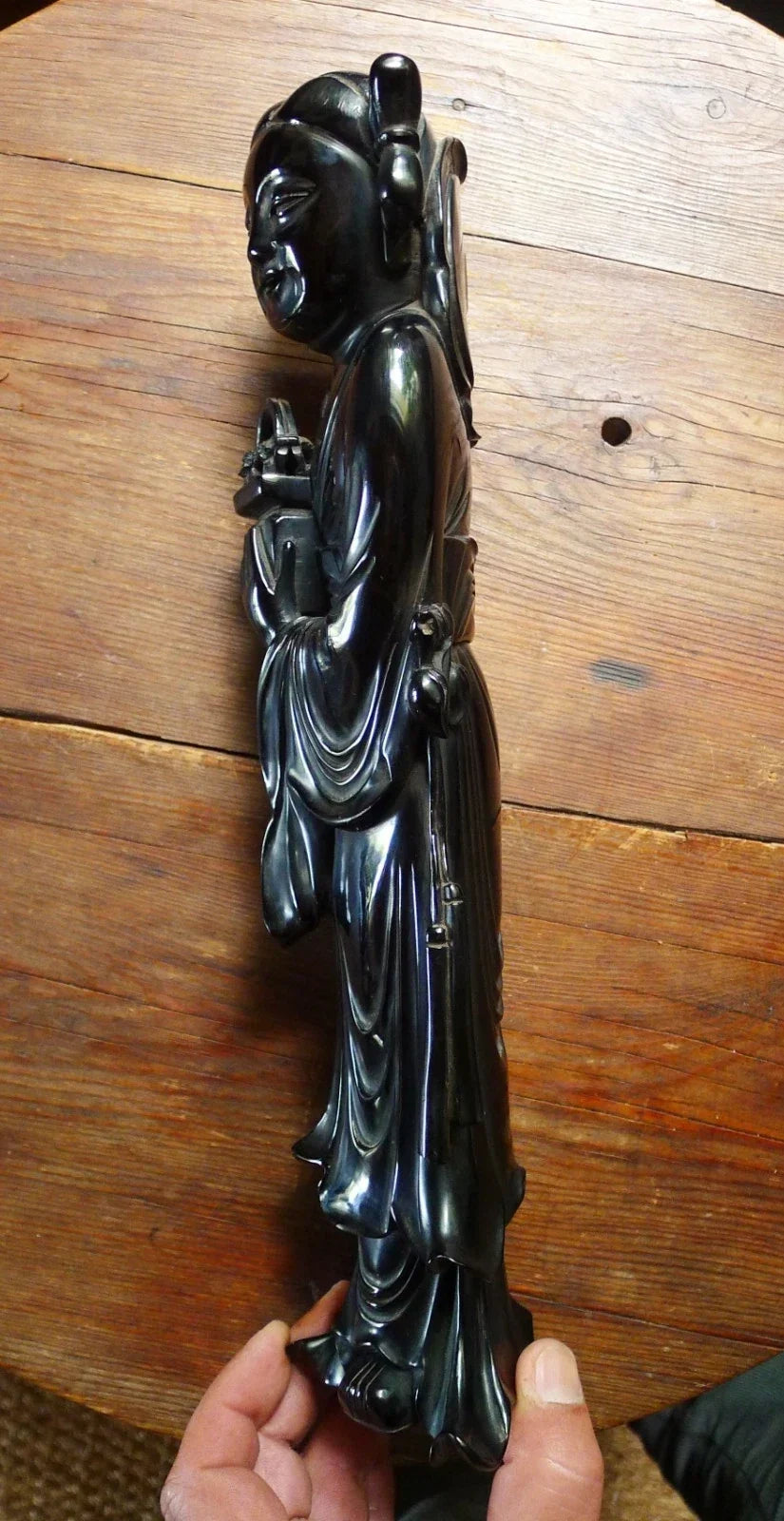 Antique cherry red bakelite statue from the early to mid-20th century