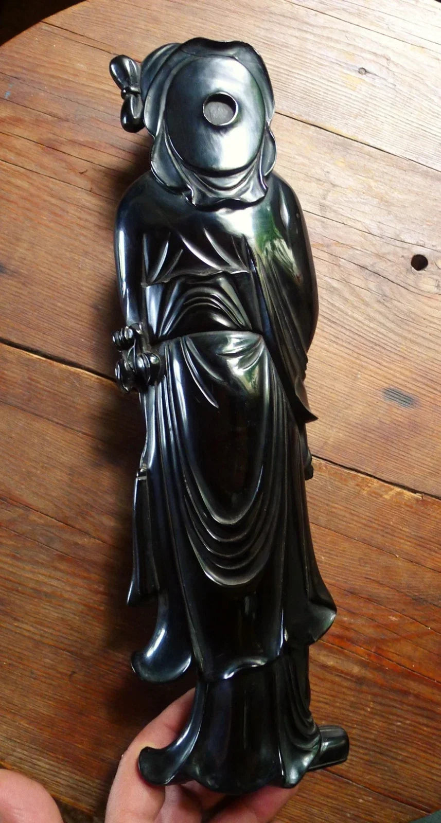Antique cherry red bakelite statue from the early to mid-20th century