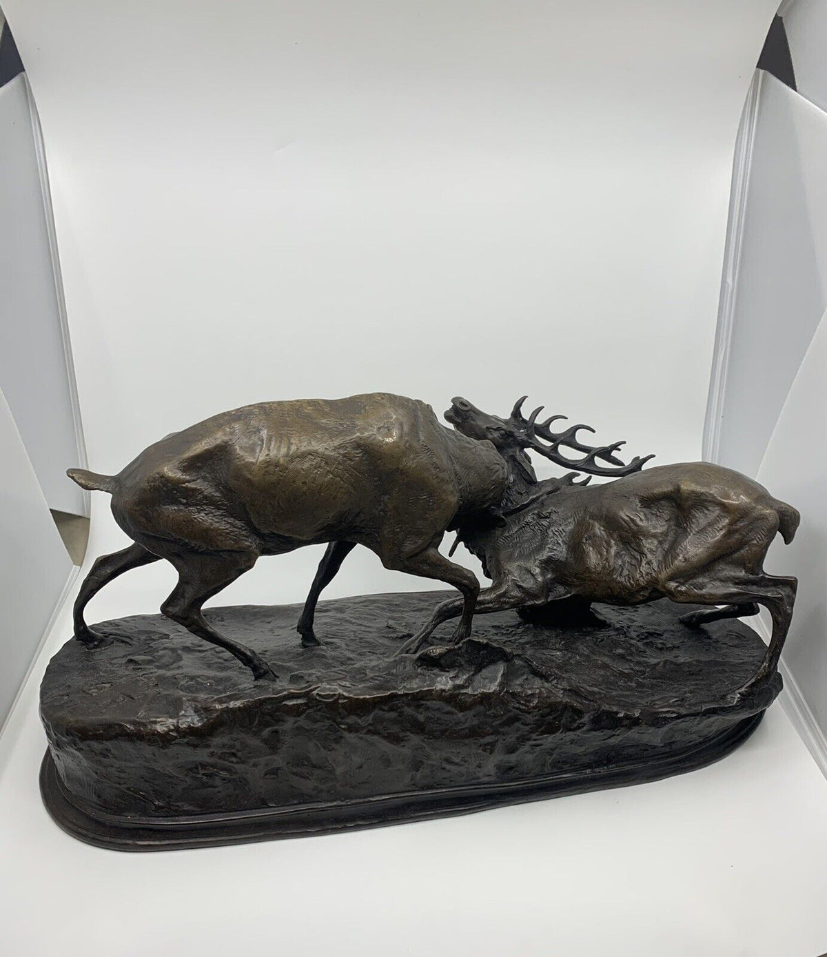Bronze sculpture of stags fighting
