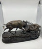 Bronze sculpture of stags fighting