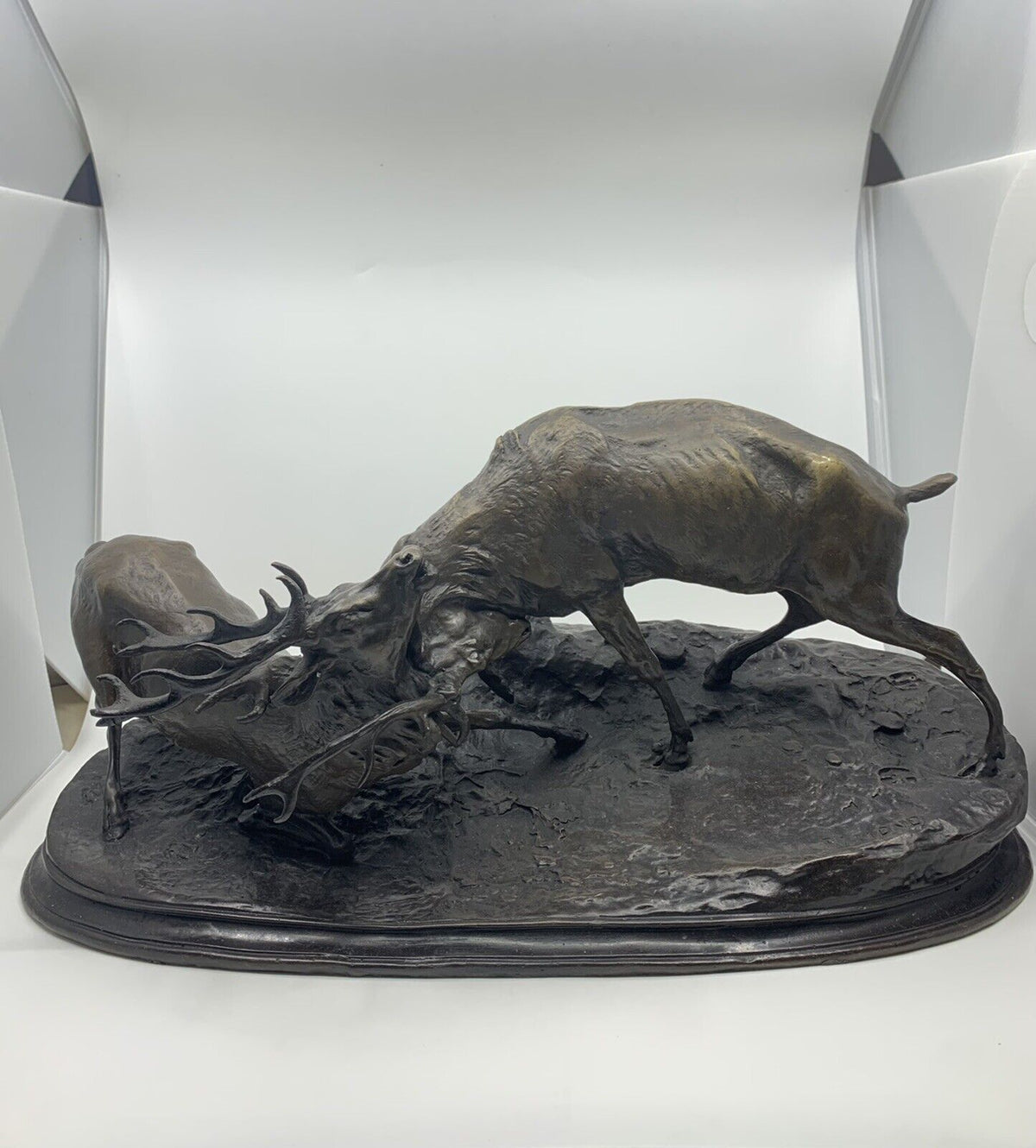 Bronze sculpture of stags fighting