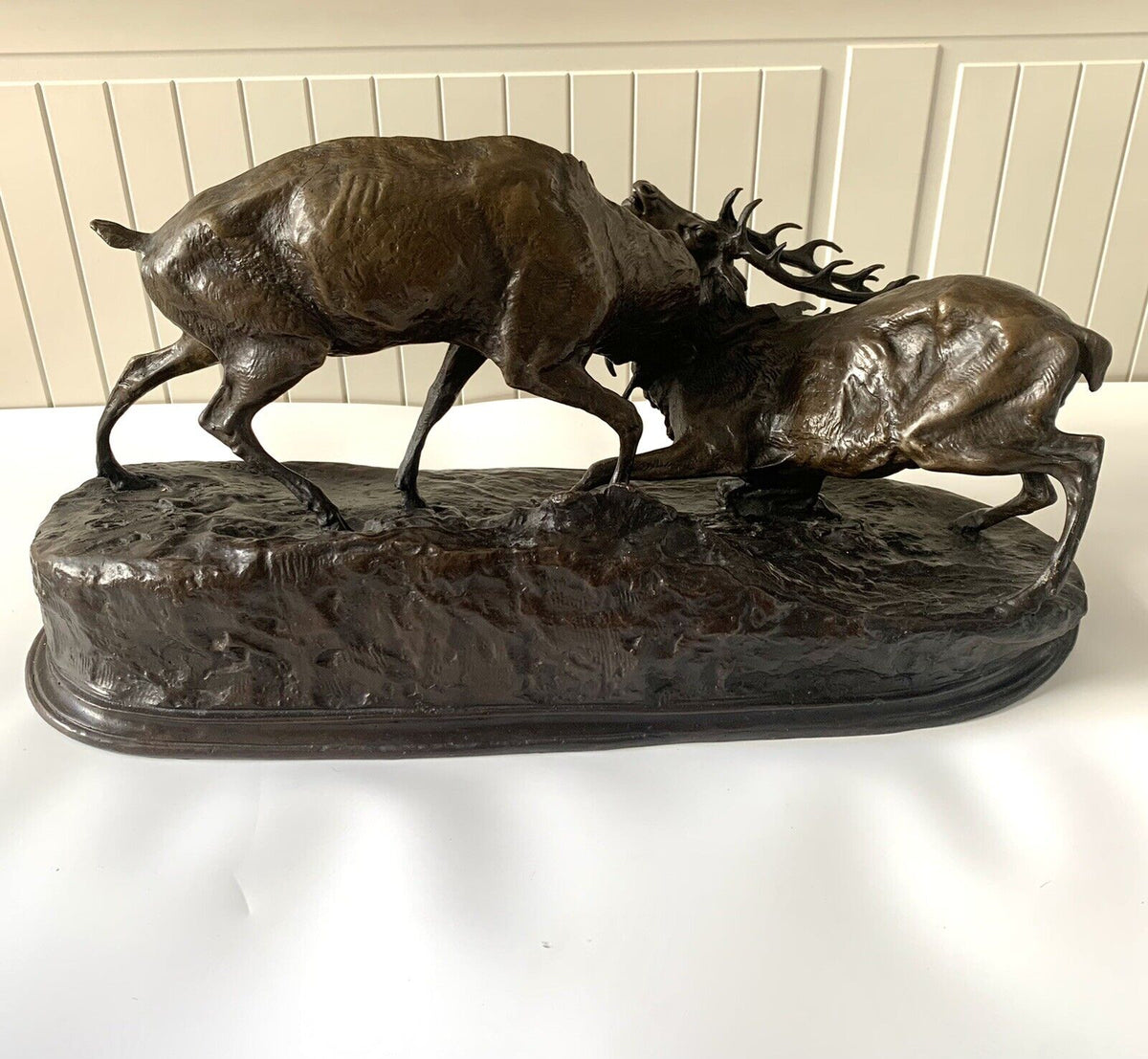 Bronze sculpture of stags fighting