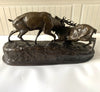 Bronze sculpture of stags fighting