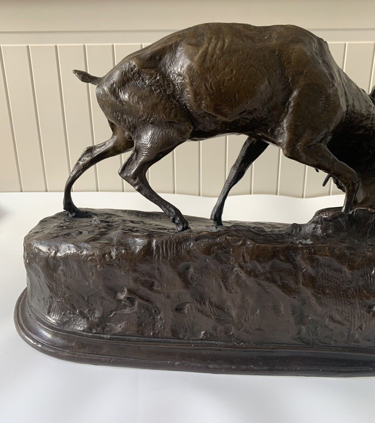 Bronze sculpture of stags fighting