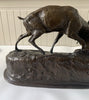 Bronze sculpture of stags fighting